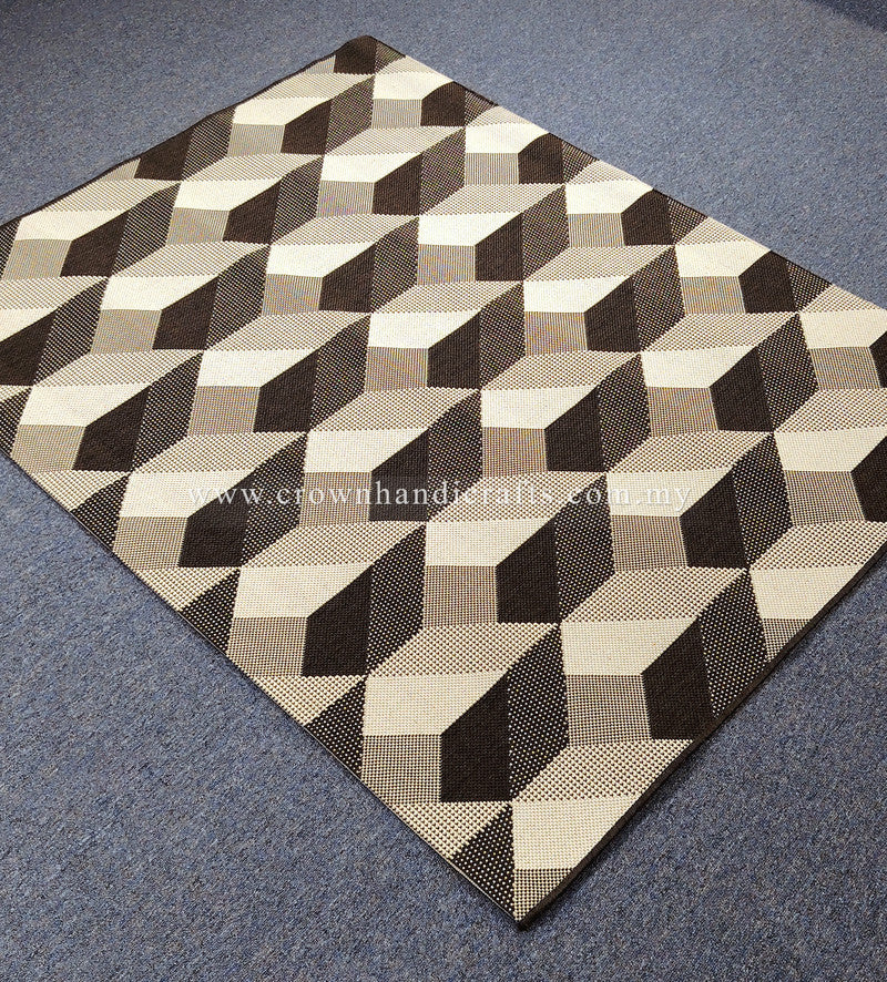 Geometric square area rug with repeating cube pattern in black, white and beige, angled view.