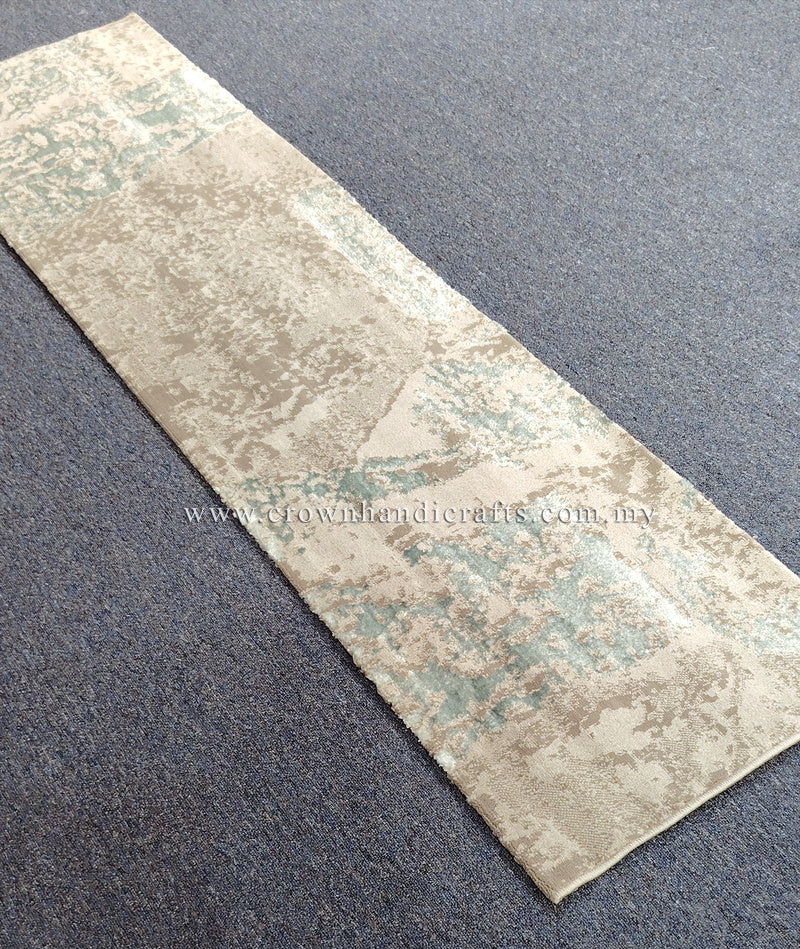 Beige runner rug with light teal faded pattern, flat weave design