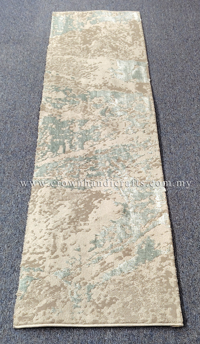 Runner rug with cream base and light blue abstract pattern, trimmed edge