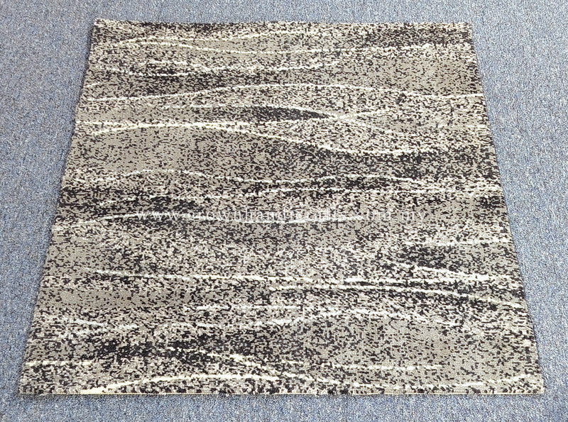 Speckled abstract rug with beige base and black, gray horizontal stripe pattern