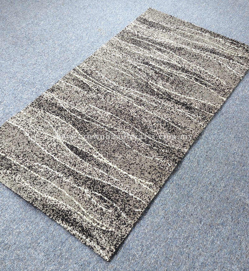 Abstract striped area rug with cream and dark gray/black flecked lines