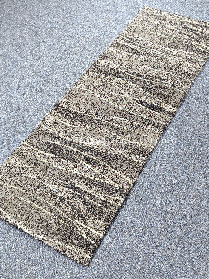 Runner rug: light beige with black speckled horizontal stripes, angled view.