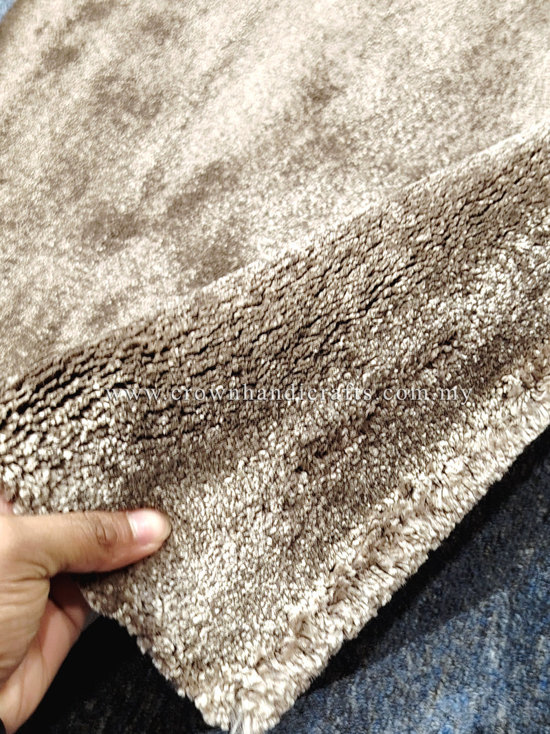 Natural brown runner rug with textured short pile and bound edges