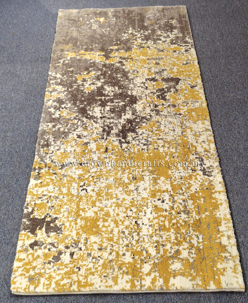 Two-tone runner rug with grey and yellow distressed abstract pattern, full-length view