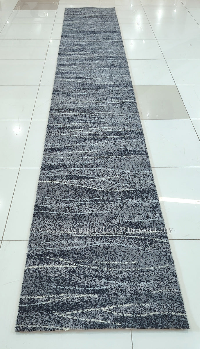 Long abstract runner rug, dark blue-gray with speckled texture and fine horizontal streaks