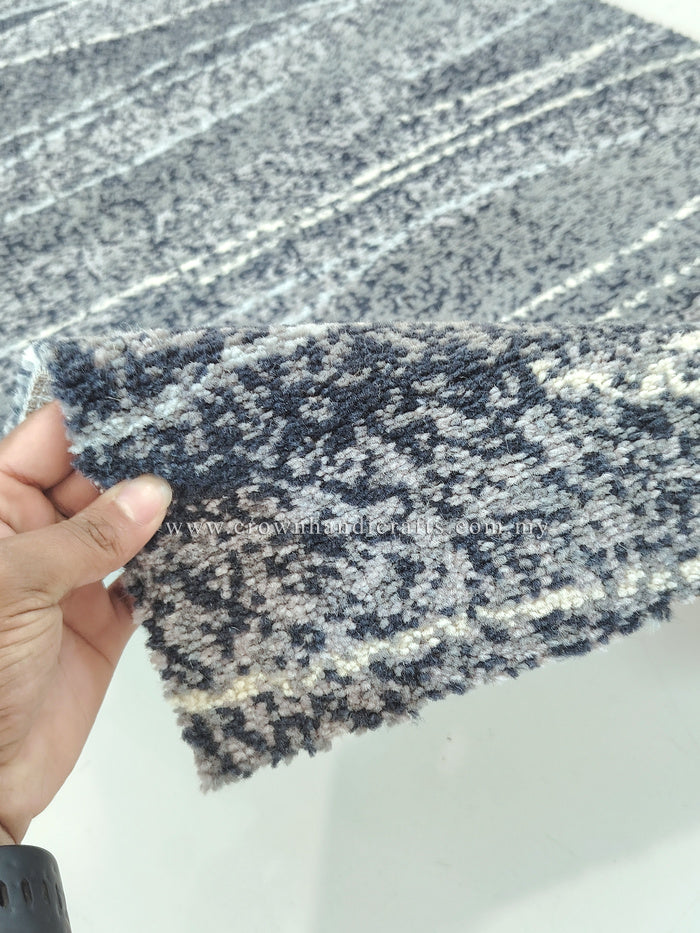 Abstract runner rug corner detail, dark blue-gray with dotted texture and horizontal lines
