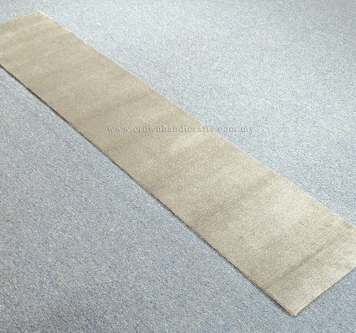 Beige runner rug with long rectangular border and lightly textured low pile