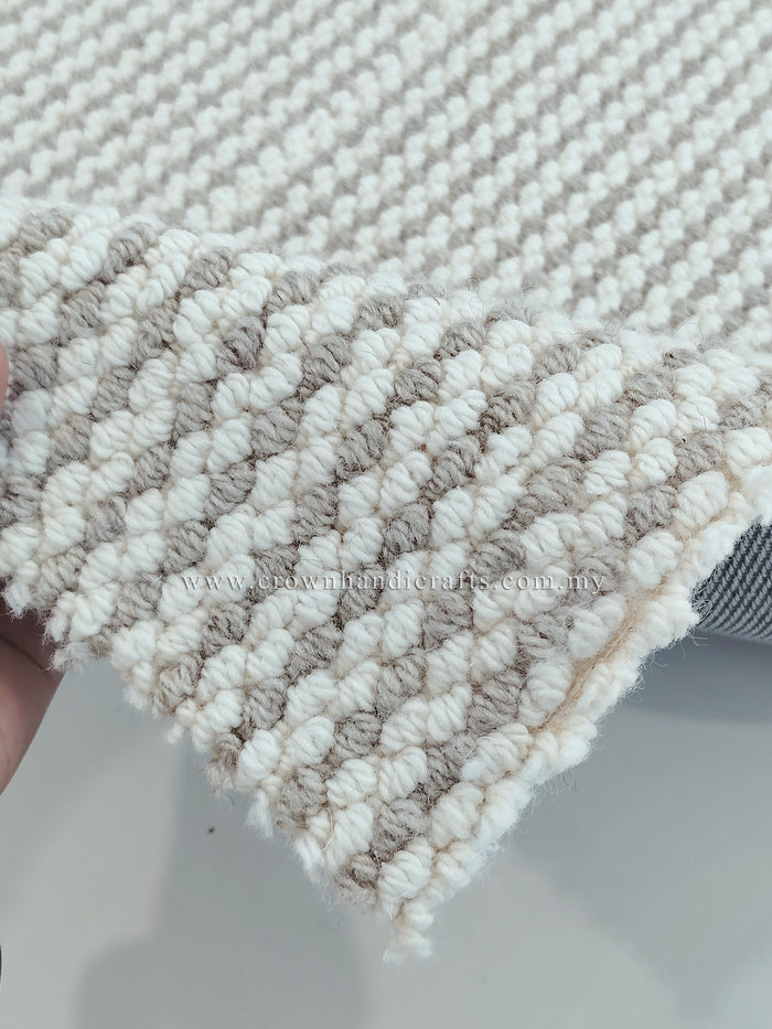 Natural-tone woven runner carpet corner detail with short loop texture