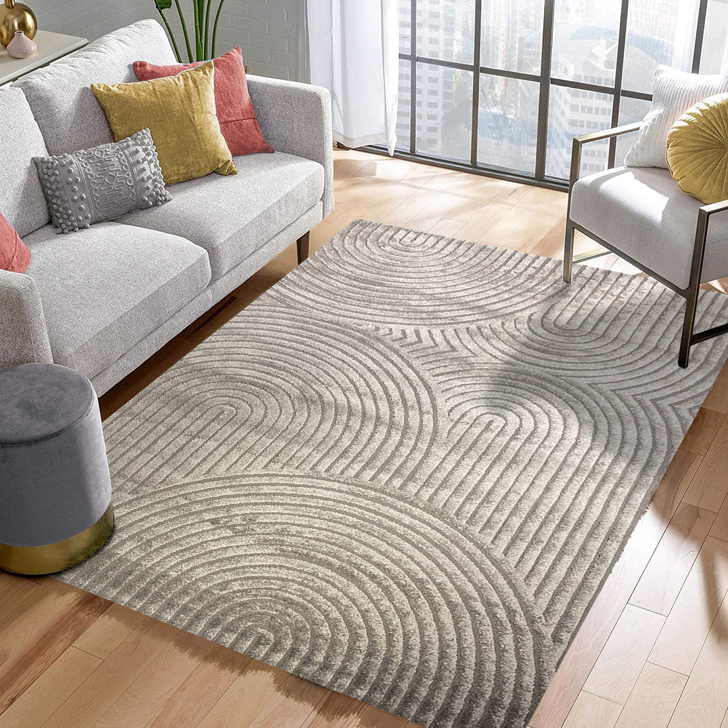 Low-pile modern rug in a bright Malaysian living room