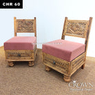Low wooden chair set with carved drawer fronts and pink upholstered seat pads