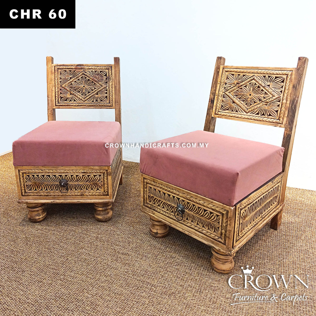 Low wooden chair set with carved drawer fronts and pink upholstered seat pads