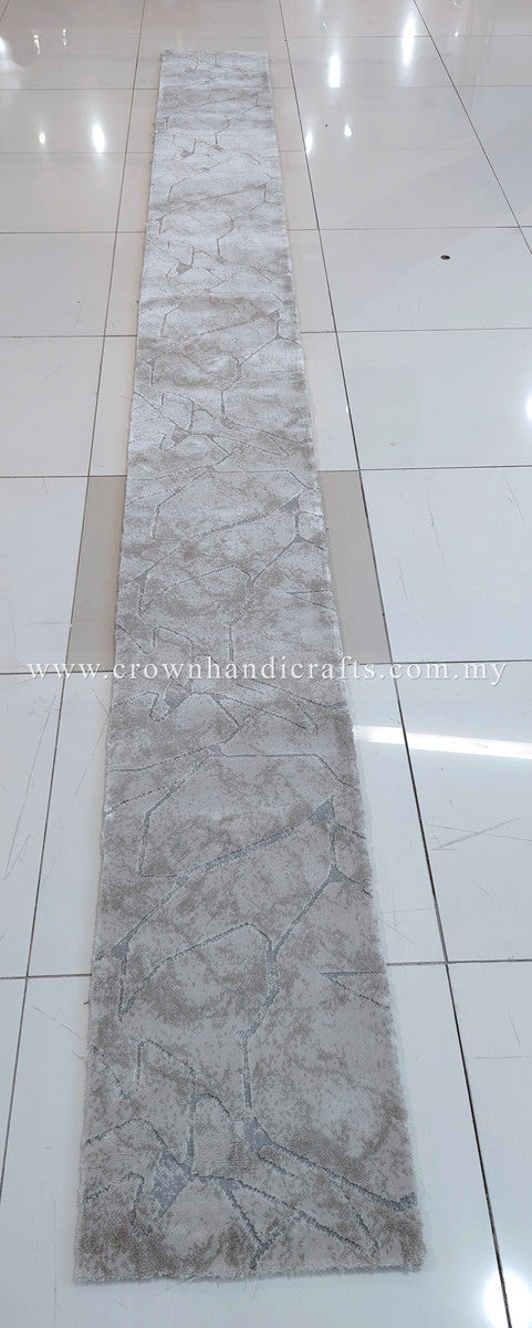 Extra-long beige textured carpet runner with subtle abstract pattern along the length