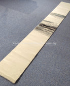 Cream runner rug with layered horizontal stripe design and flat woven surface