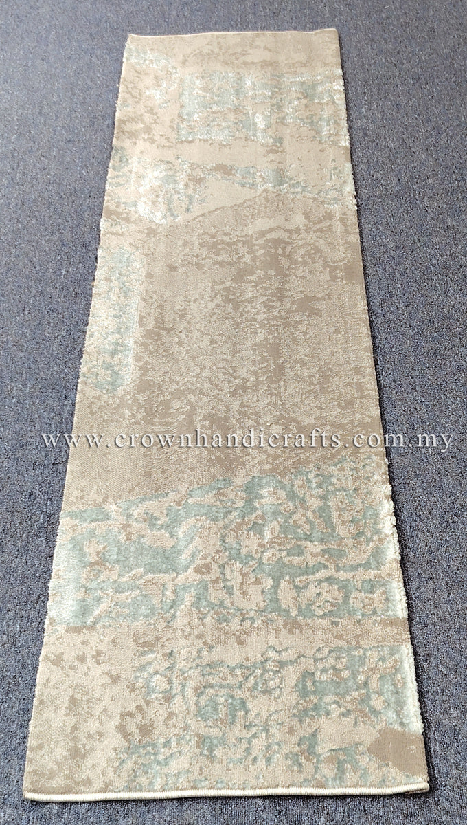 Beige runner rug with light teal distressed pattern, even flat weave surface