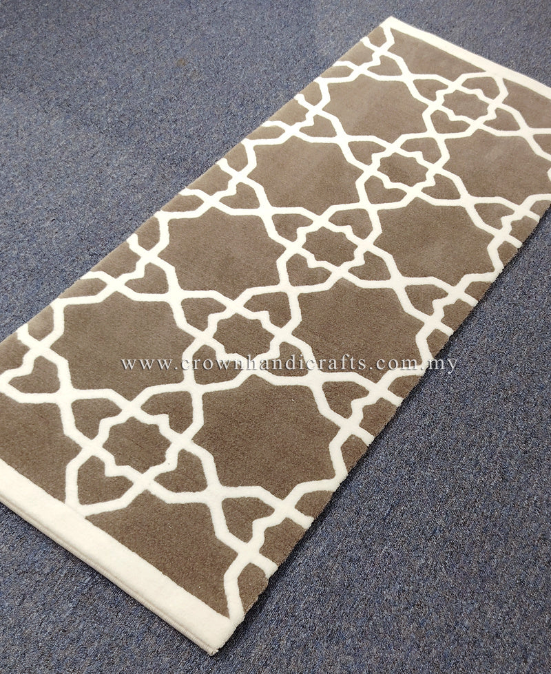 Rectangular runner rug featuring white lattice pattern on grey-brown with cream binding.