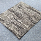 Abstract striped rug with speckled beige and charcoal gray horizontal bands