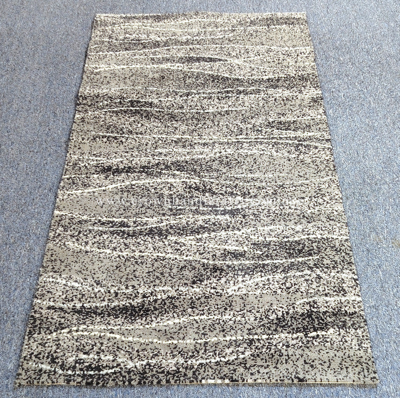 Abstract striped area rug with cream field and dark gray flecked horizontal lines