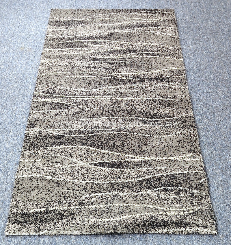 Abstract striped area rug with cream and charcoal speckled bands in a rectangular shape