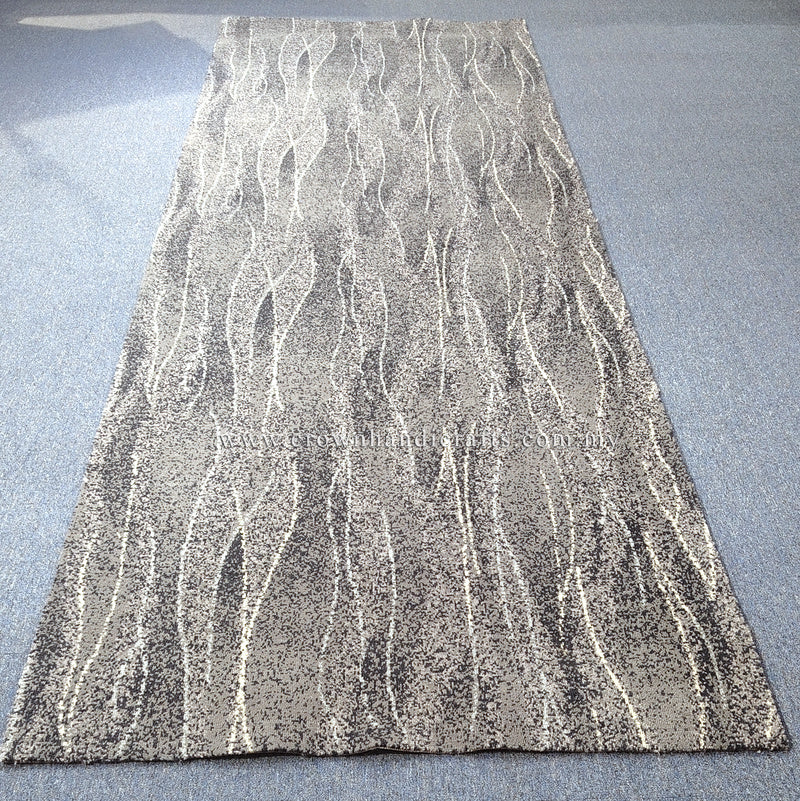 Abstract floor rug, light beige with white flowing line pattern; full rug view.