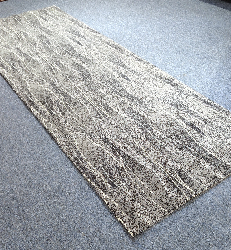 Abstract floor runner rug, light beige with thin vertical line pattern and dark speckle border.