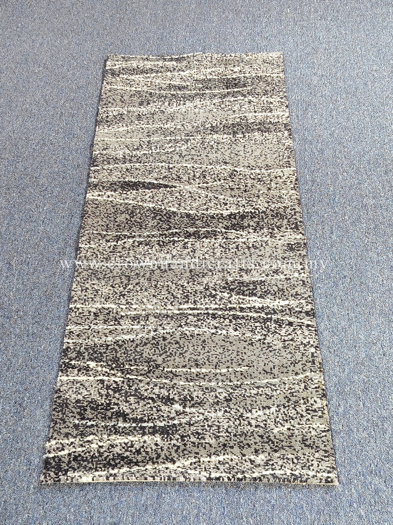 Beige abstract hallway runner rug with fine dark stripes, centered on floor