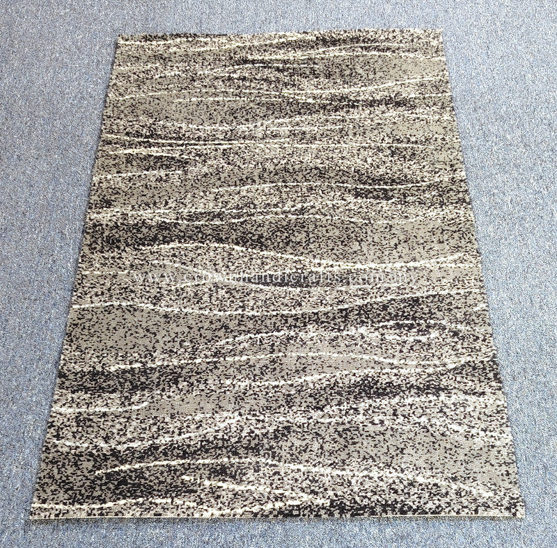 Abstract area rug with cream and black speckled horizontal stripes, flat view