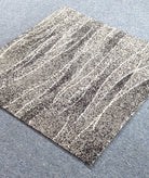 Square abstract area rug with beige tones, speckled vertical stripe pattern