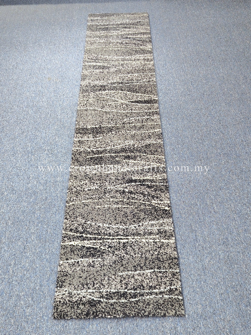 Slim runner rug featuring abstract horizontal stripes with speckled texture in gray