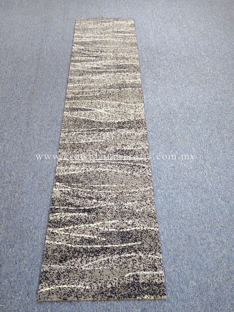 Narrow abstract runner rug with striped, speckled design in light and dark gray