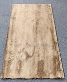 Beige-brown runner rug with plush low pile and stitched hem