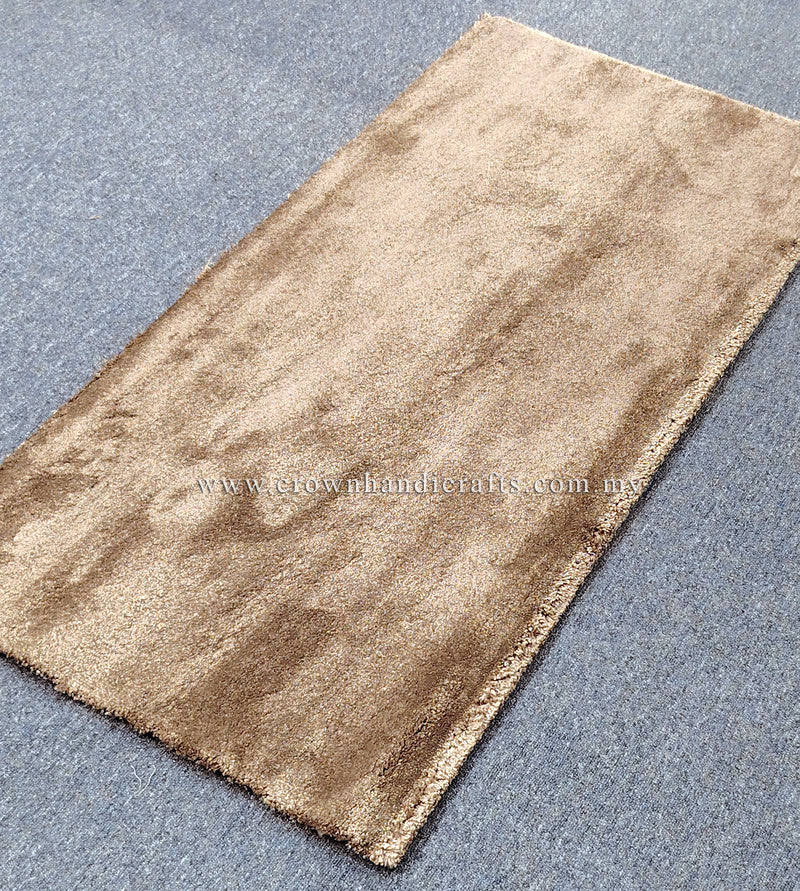 Beige-brown runner rug with shimmering textured weave and flat bound edges