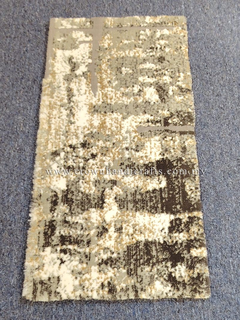 Compact grey mat rug, beige surface with dark patchwork-style abstract motif