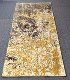 Hallway runner rug with short pile, grey and gold speckled abstract motif on rectangular weave