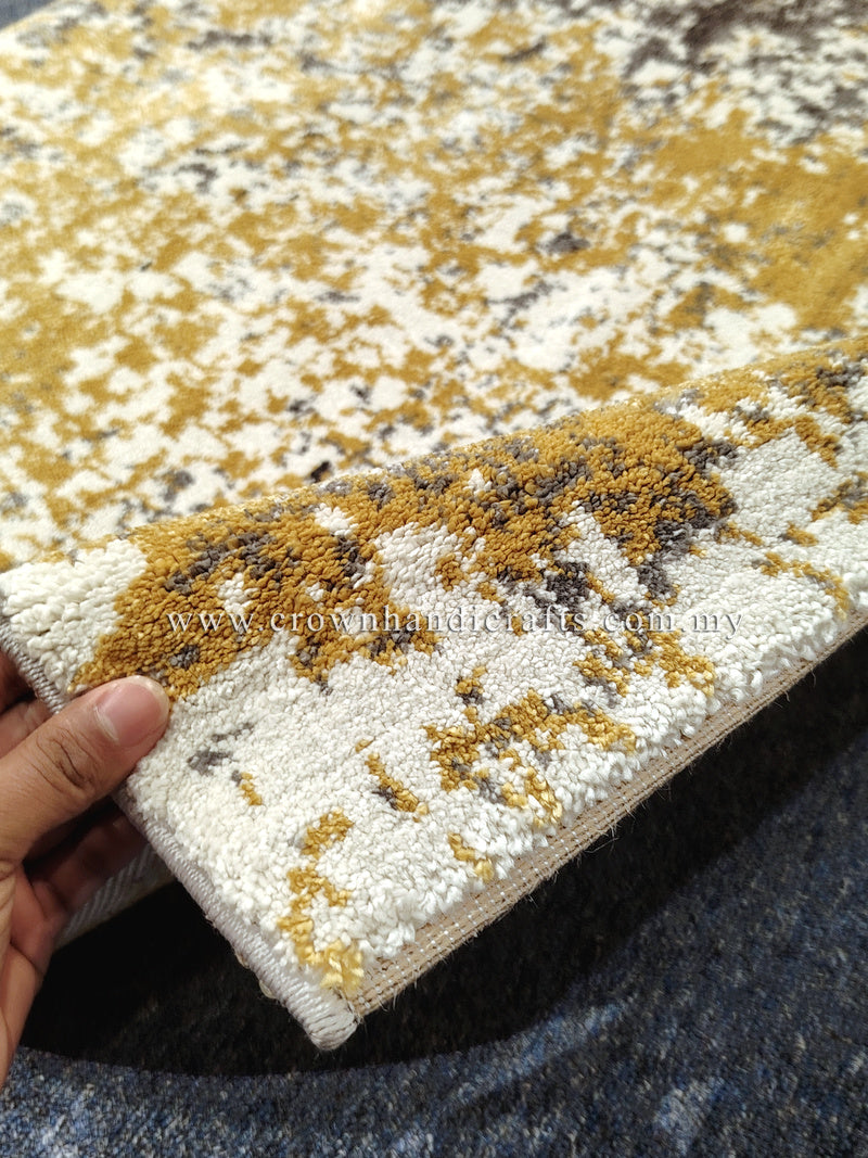 Hallway runner rug with cream, grey, and yellow speckled abstract pattern, textured edge