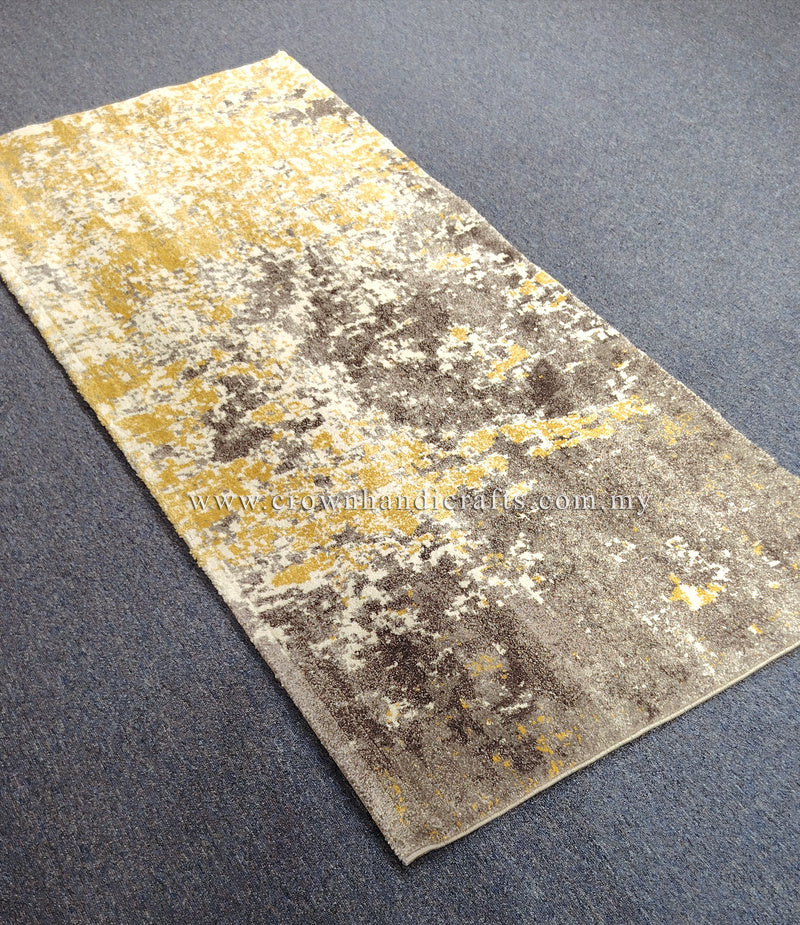 Two-tone runner rug with grey and yellow abstract distressed pattern, angled view