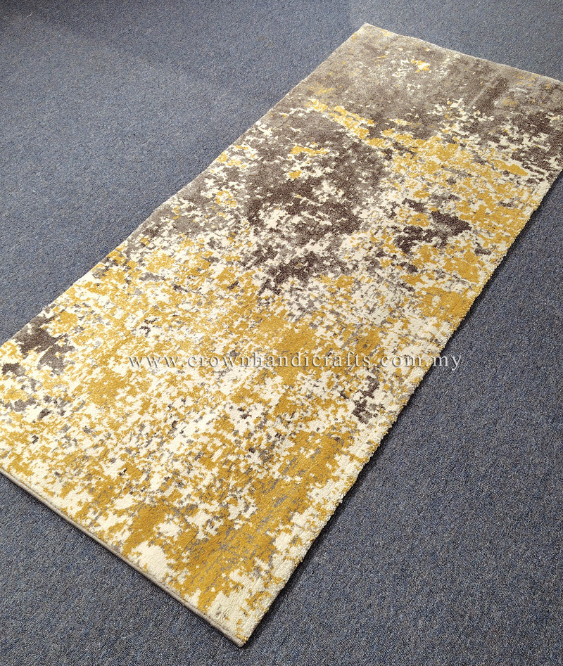 Two-tone runner rug with grey and yellow distressed abstract pattern, flat on floor