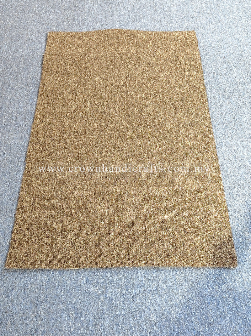 Rectangular brown door mat rug, evenly textured surface with flat edges