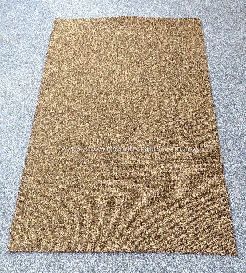 Rectangular brown-tan rug with dense speckled pile, viewed from above