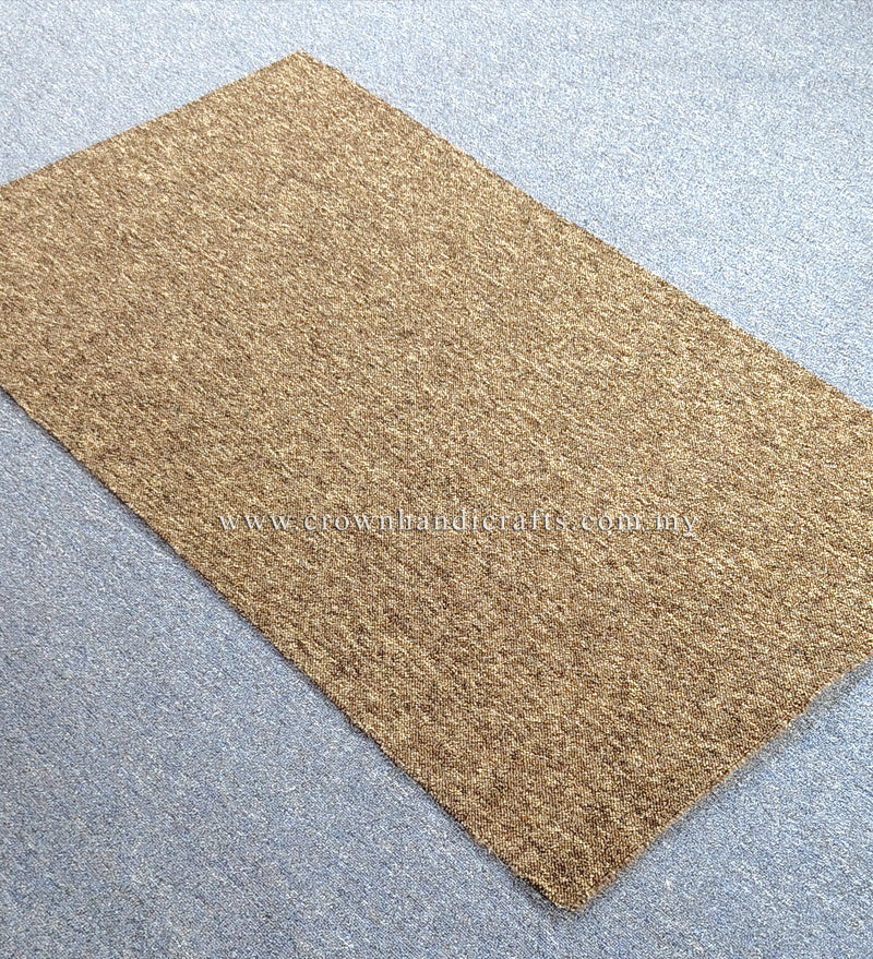 Rectangular brown-tan rug with fine speckled texture, flat lay on light floor