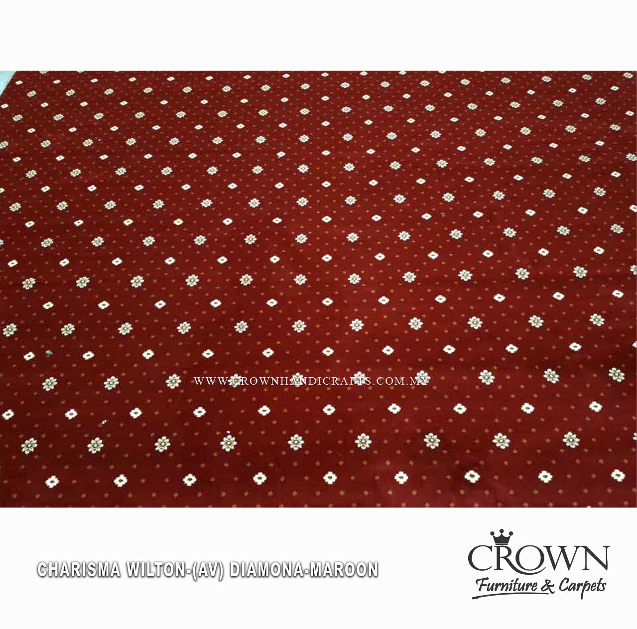 Wall-to-wall carpet in maroon with repeating small star medallion pattern