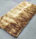 Brown multi-tone runner rug with mottled pattern, top-down angled view