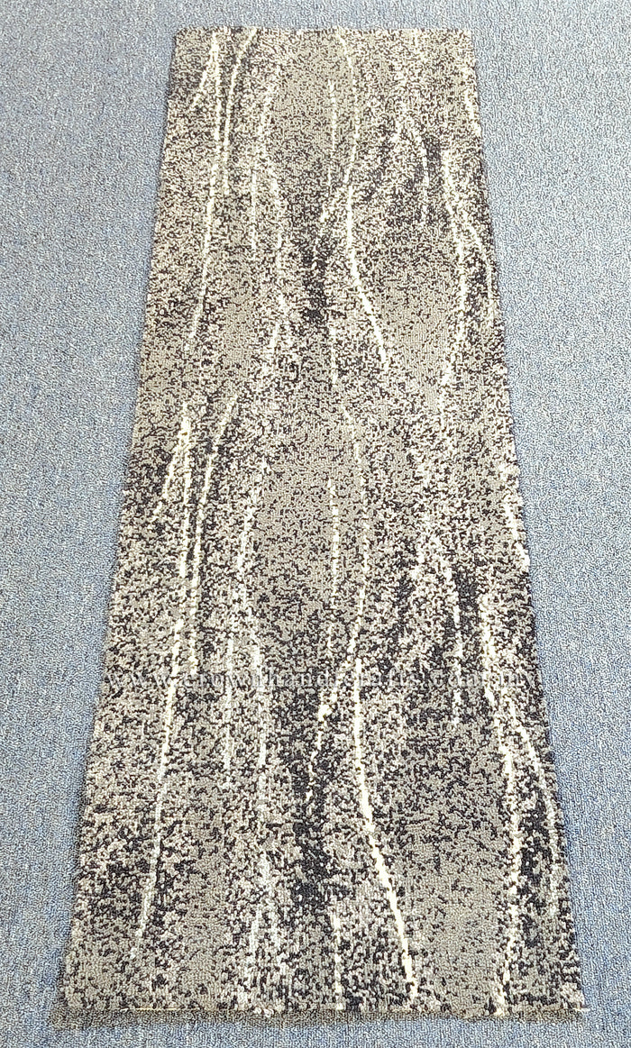 Abstract runner rug with beige base and vertical distressed stripe pattern