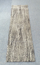 Abstract runner rug with cream-beige and gray mottled stripe design, flat view
