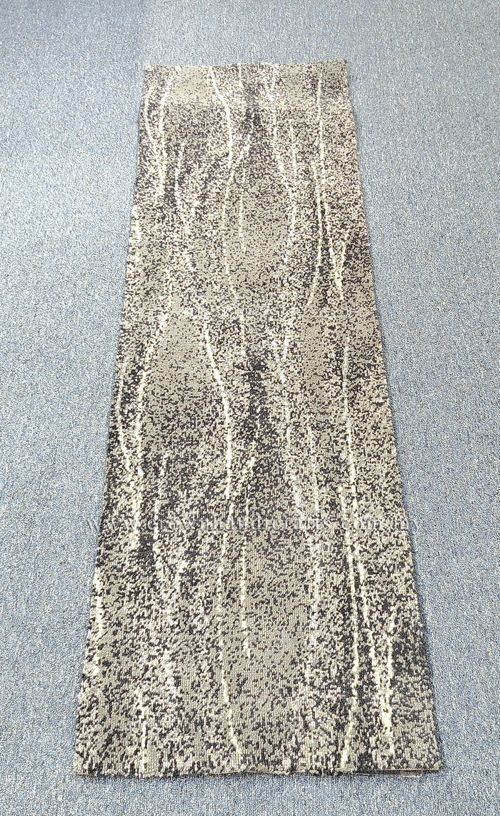 Abstract runner rug with cream-beige and gray mottled stripe design, flat view