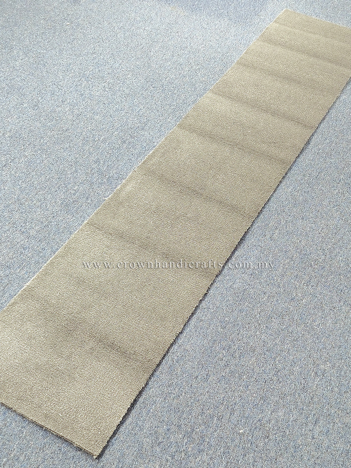 Beige runner rug with smooth texture, flat woven look, and straight borders