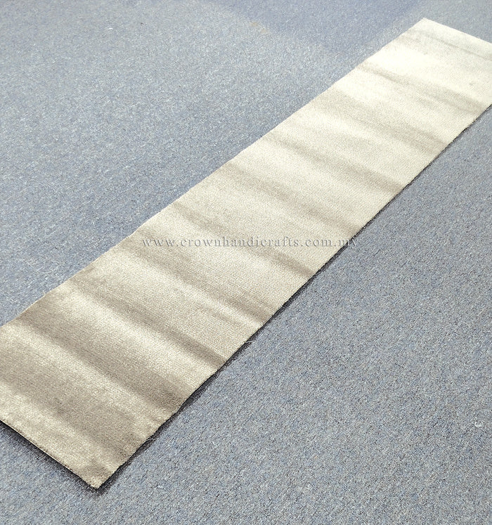 Beige runner rug section with subtle stripes and smooth low-pile surface