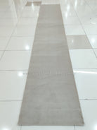 Oatmeal beige runner rug, full length view with smooth straight edges