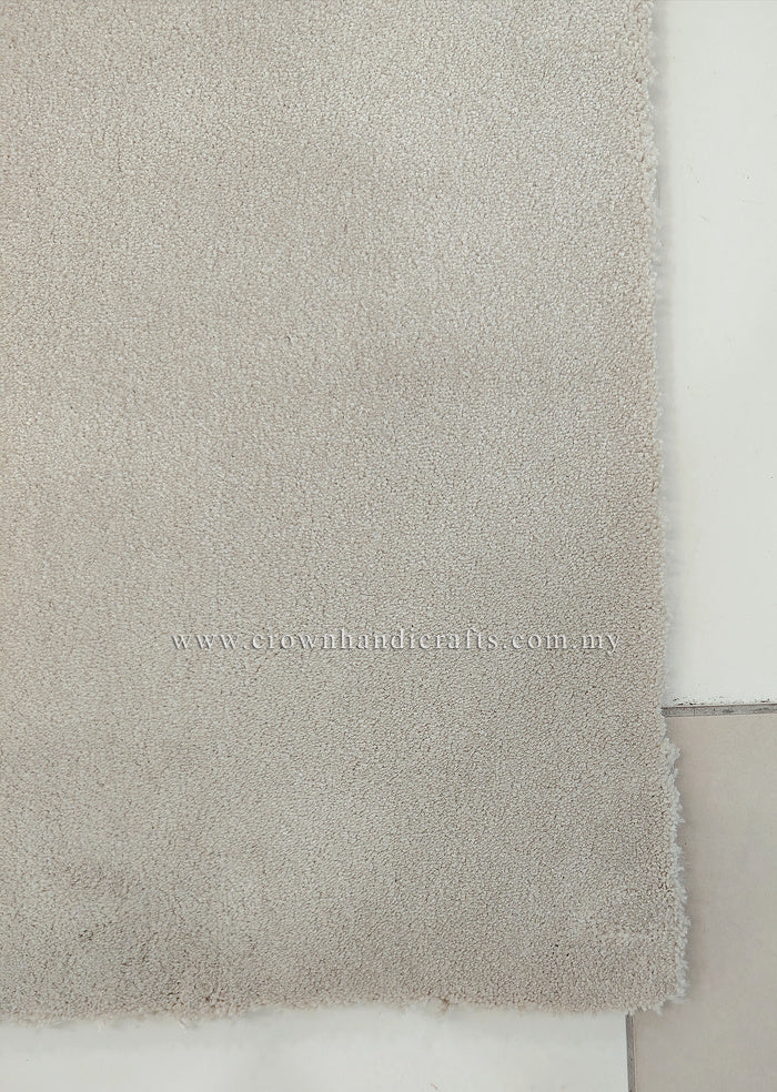 Oatmeal beige soft runner rug, close-up of textured short pile edge
