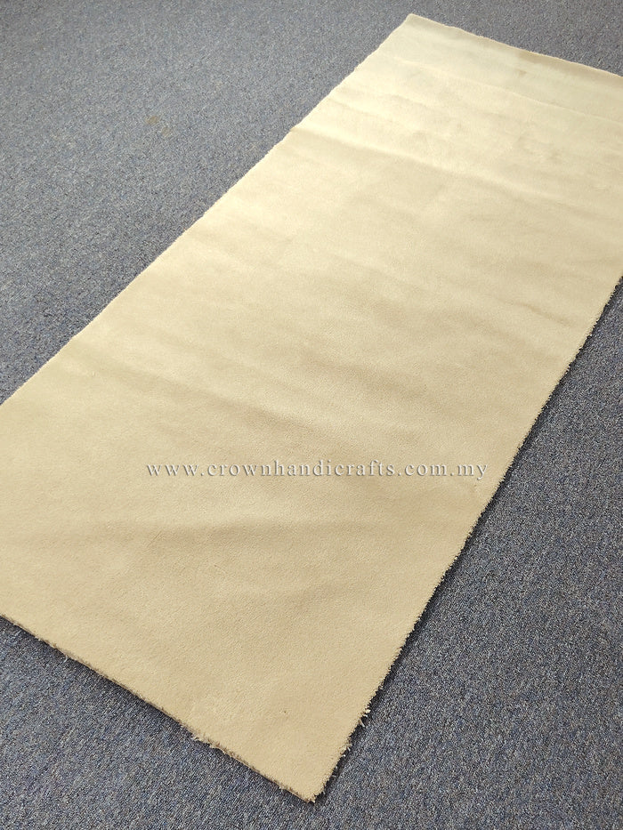 Oatmeal-beige runner rug laid flat with clean border and even, short pile