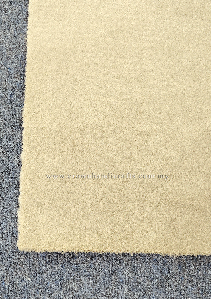 Oatmeal-beige runner rug with soft, short pile and visible border edge